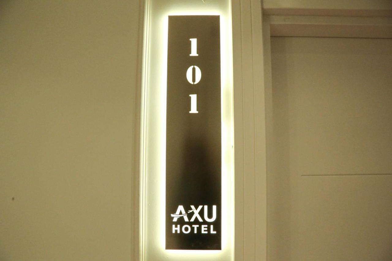 Axu Airport Hotel Arnavutkoy 외부 사진 A room sign at Axu Hotel